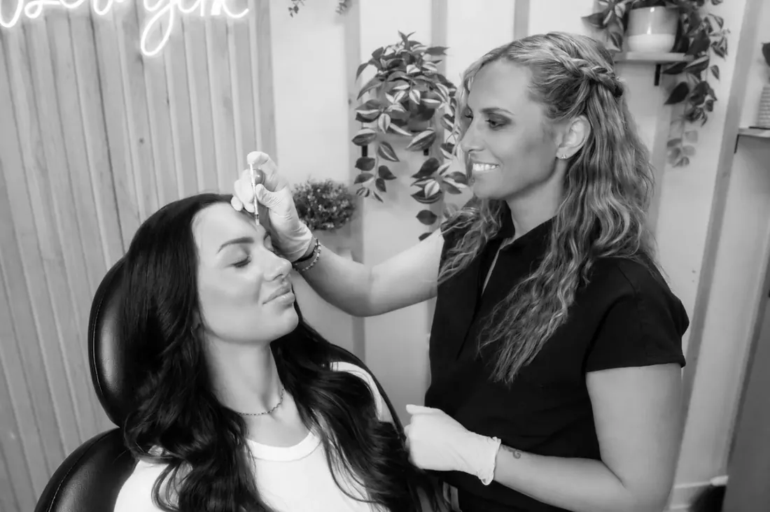 A Glow Med Spa provider giving a neurotoxin injection